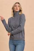 Maglione dolcevita con micro paillettes