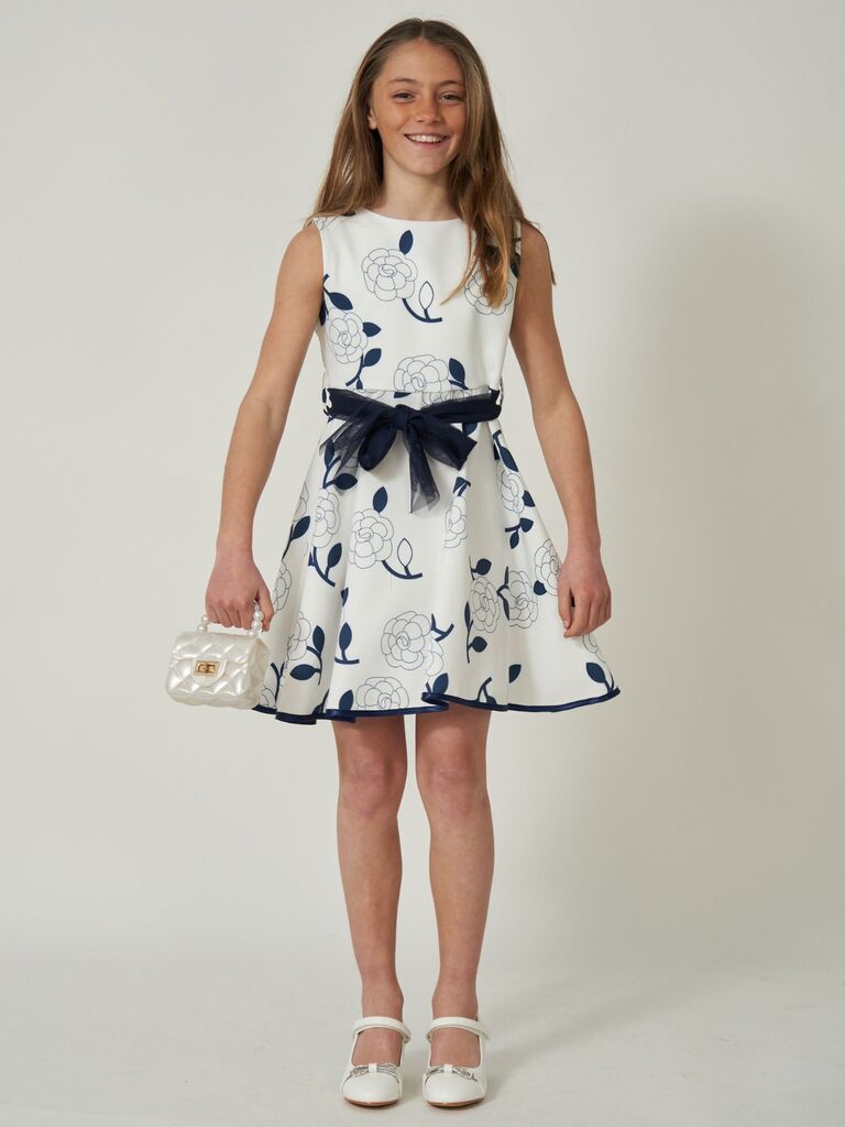Vestito a ruota con fiori e fiocco