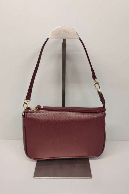 Borsa martellata con tracolla regolabile