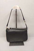 Borsa martellata con tracolla regolabile