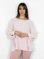 Camicia con fiocchi sui polsi