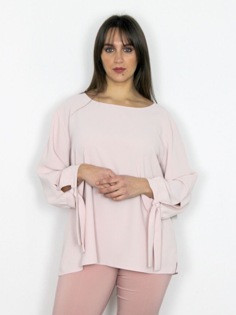 Camicia con fiocchi sui polsi