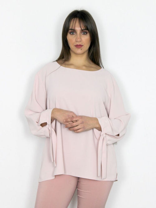 Camicia con fiocchi sui polsi