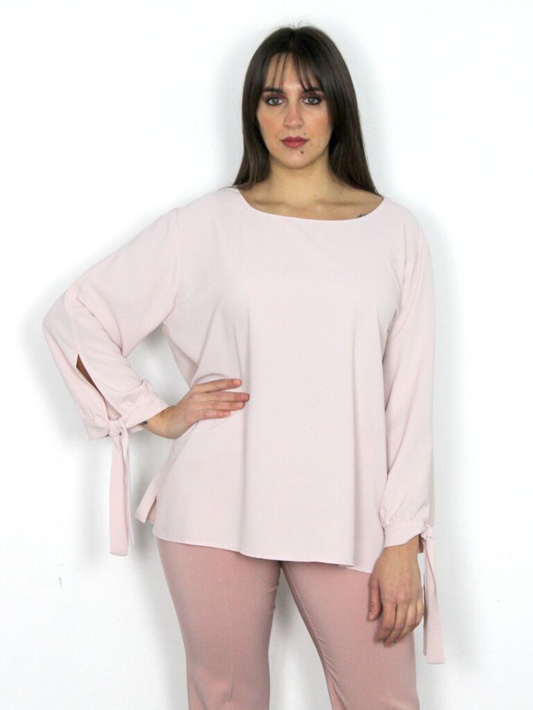 Camicia con fiocchi sui polsi