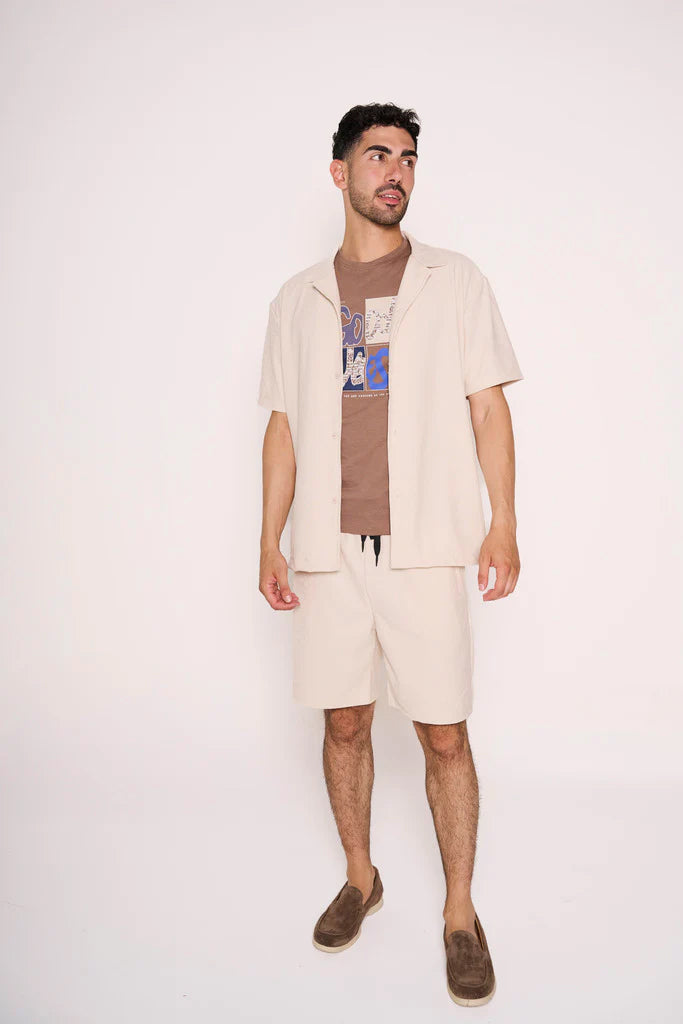Camiciotto Beige con Collo Bowling