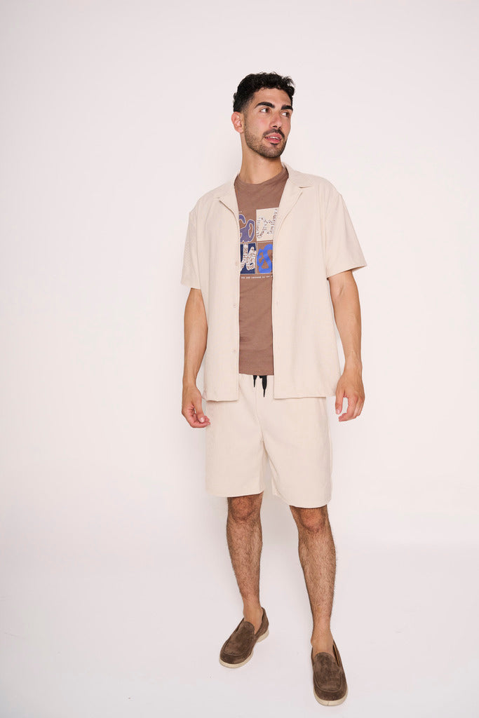 Camiciotto beige con collo bowling