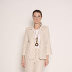 Giacca tailleur minimal con bottoni e tasche a filetto