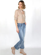 Jeans a zampa con fiocchetti
