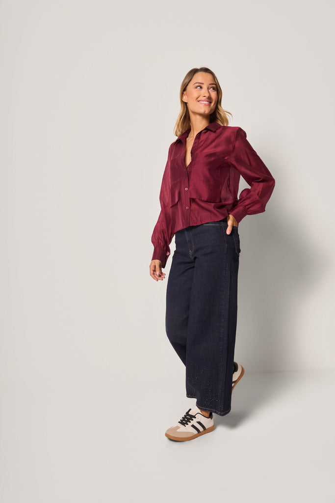 Jeans a zampa con strass