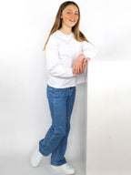 Jeans con cuori e perlina