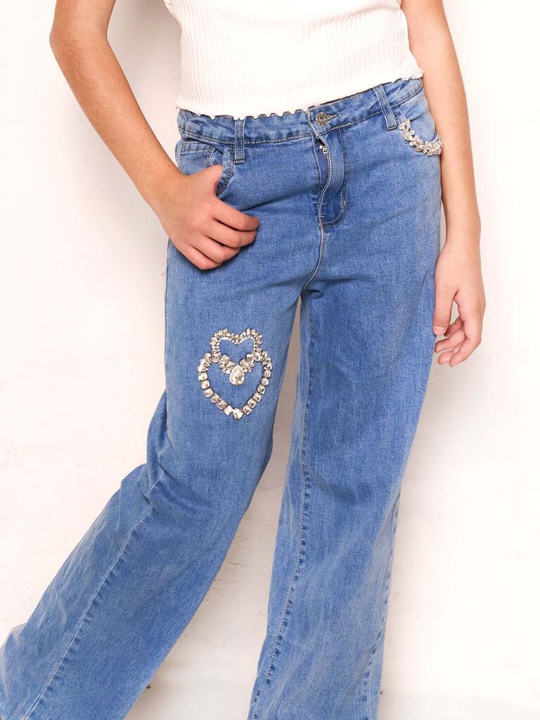 Jeans con cuore strass