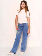 Jeans con cuore strass