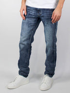 Jeans slavato con graffi