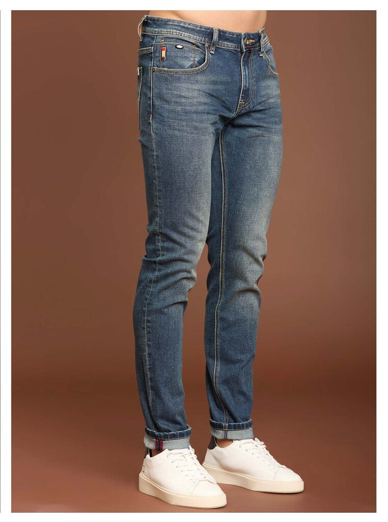 Jeans slim fit con baffature