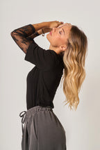 Maglia con maniche in pizzo donna