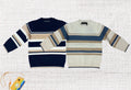 Maglione per neonato a righe