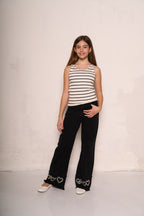 Pantalone a zampa con cuori