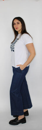 Pantaloni in denim blu a gamba larga