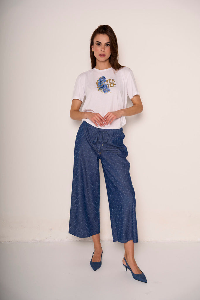 Pantaloni cropped con elastico in vita e strass