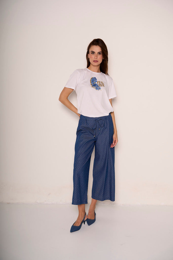 Pantaloni cropped con elastico in vita e strass