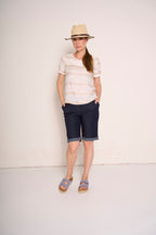 Pantaloncino in denim blu con risvolto