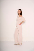 Pantalone con risvolto in vita e strass
