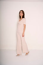 Pantalone con risvolto in vita e strass