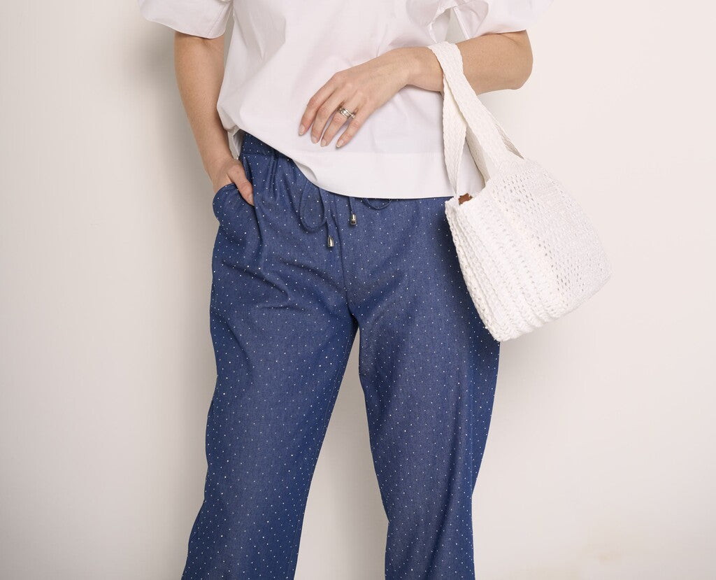 Pantalone con strass e risvolto