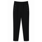 PANTALONI CON BOTTONI APPLICATI