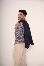 Pantaloni con pences e risvolto