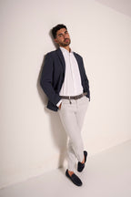 Pantaloni slim fit con ciondolo