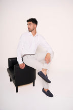 Pantaloni slim fit con ciondolo