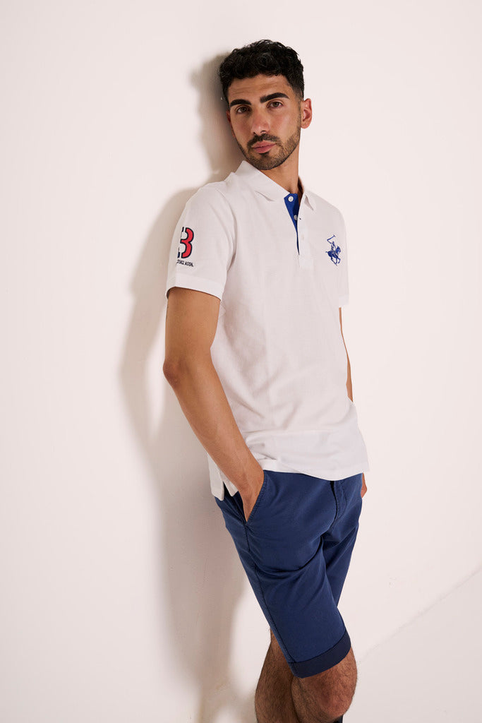 Polo in piquet con ricami e dettagli a contrasto